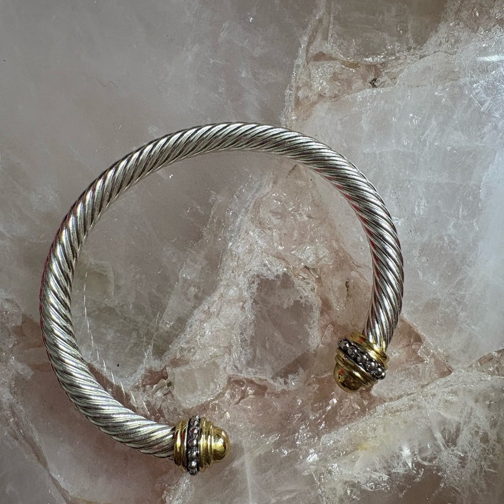Elegant Silver and Gold-Tone Twisted Bracelet